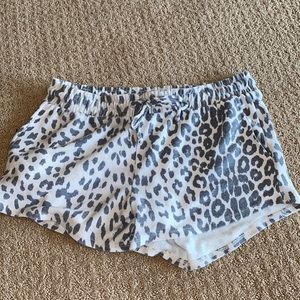 Chaser leopard shorts. Never worn!! Size M.